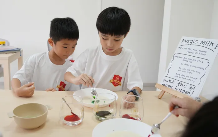 Students exploring a hands-on science experiment during enrichment time
