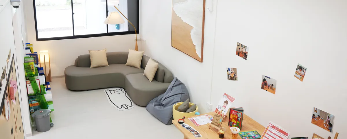 Bright learning lounge where children relax and play at the Eunos centre